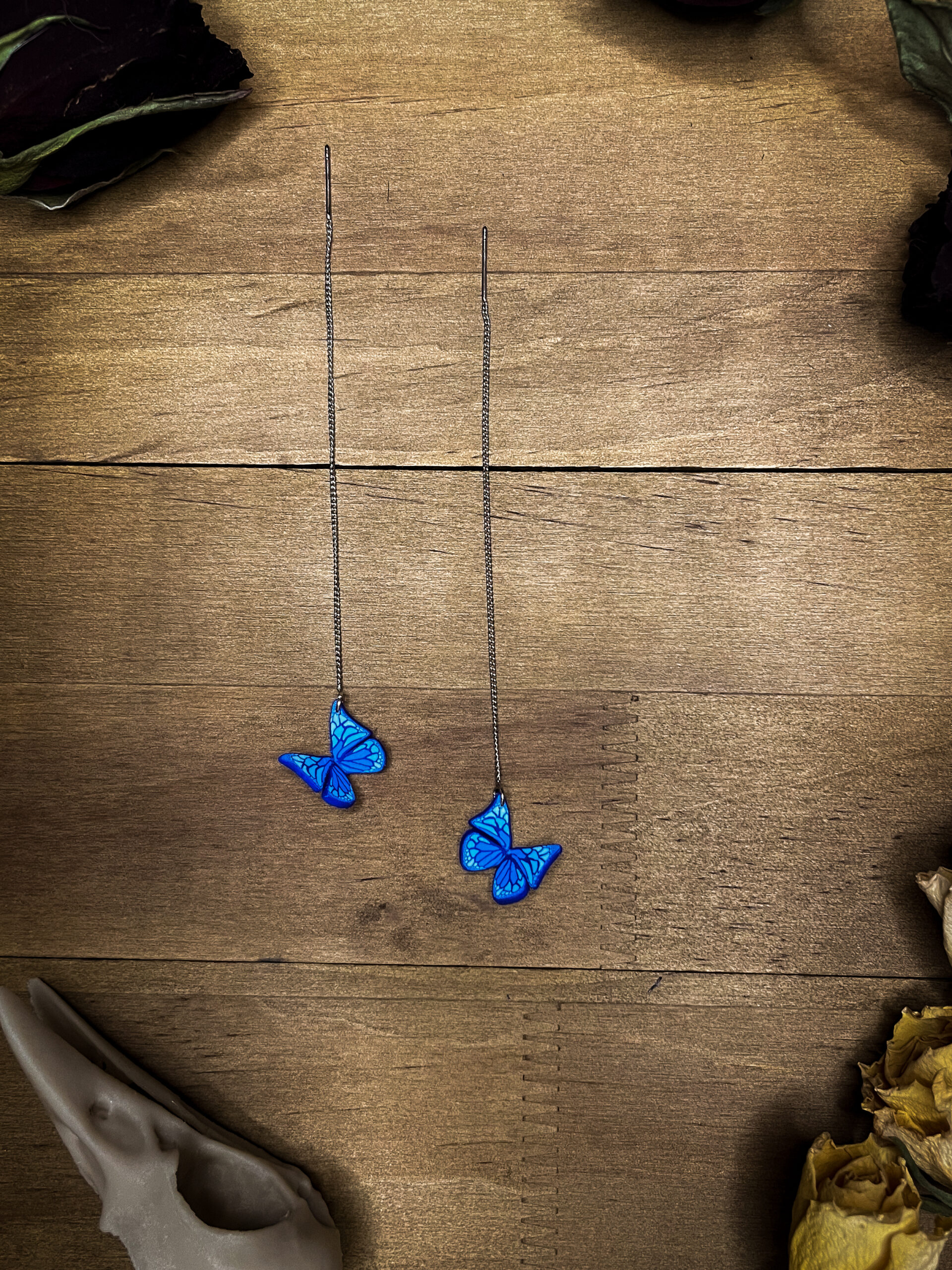 Handmade Blue Butterfly Earrings with Delicate Thread Design