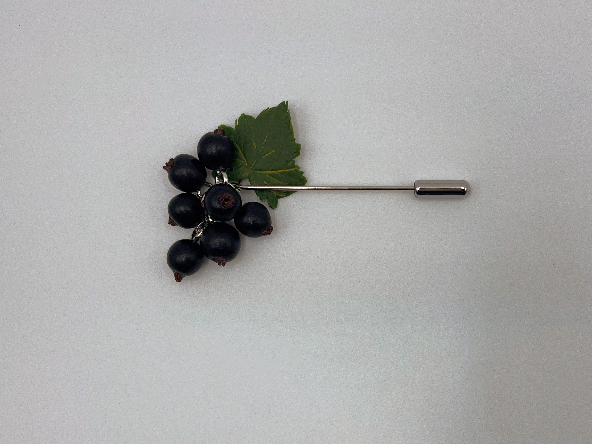 Handcrafted Black Currant Brooch with Leaf Detail